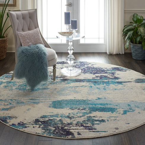 2' X 4' Ivory And Teal Blue Abstract Power Loom Non Skid Area Rug